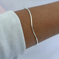 BRACELETE ONDULADO REDONDO LISO