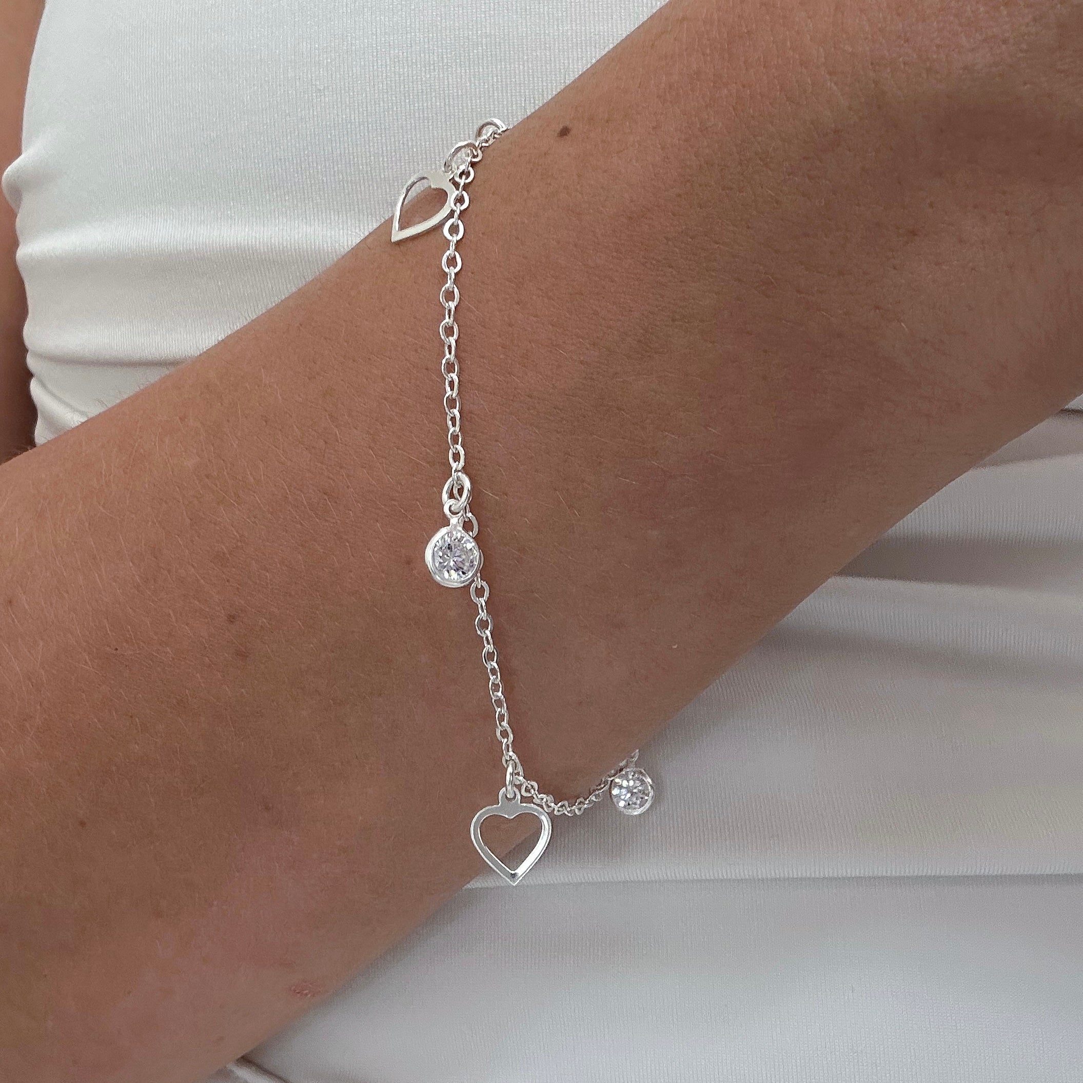 PULSEIRA CORAÇÕES PINGOS DE LUZ 18,5CM