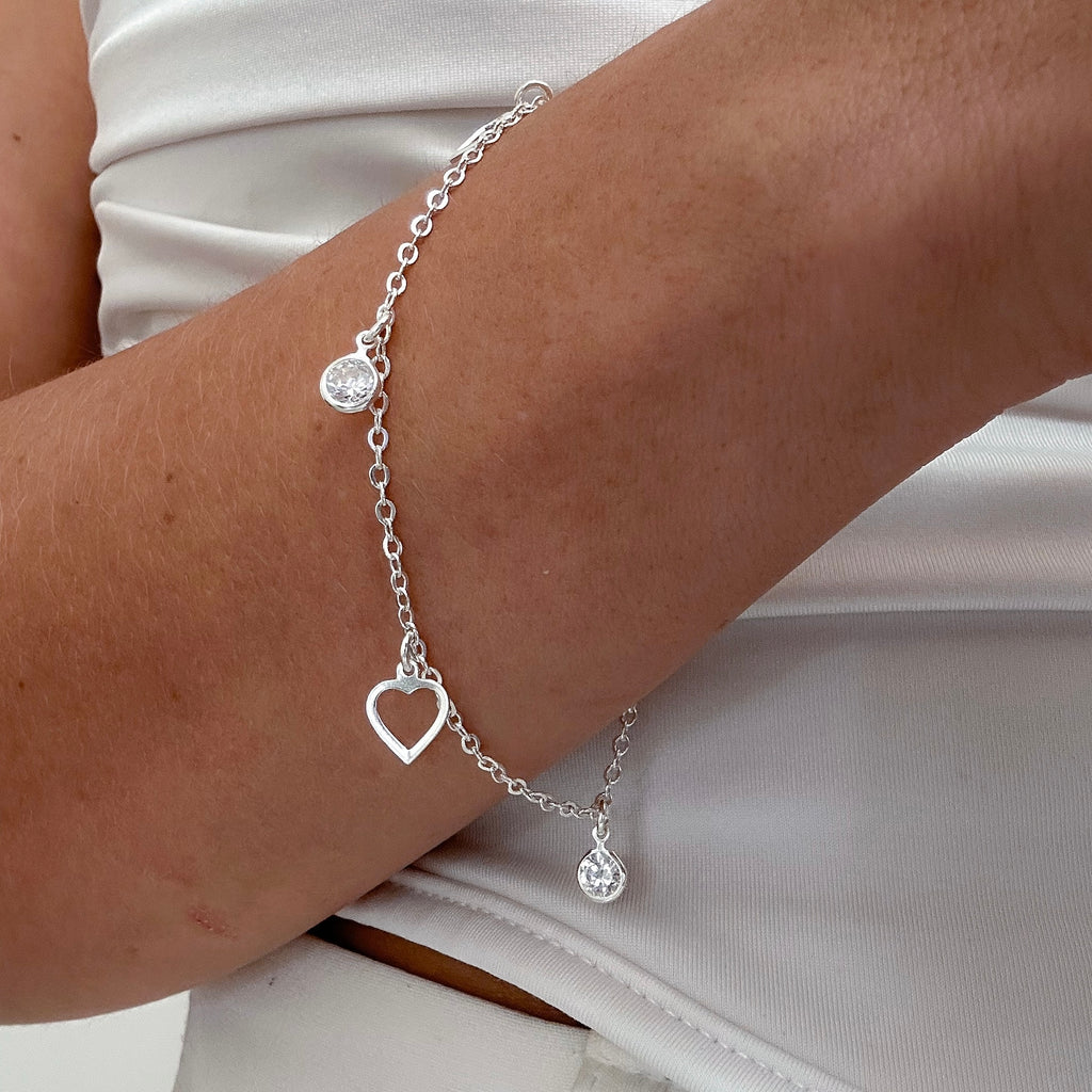 PULSEIRA CORAÇÕES PINGOS DE LUZ 18,5CM
