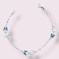 PULSEIRA BORBOLETAS AZUIS E PRATA 18,5CM